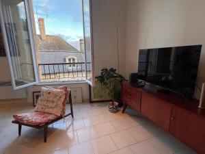 Chambre privative au calme en plein centre avec balcon