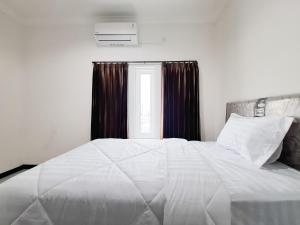 Surya Living RedPartner near Suncity Mall Madiun