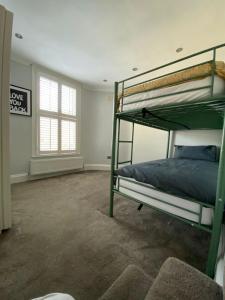 Stylish 3-Bed Flat Opposite Central Line Station