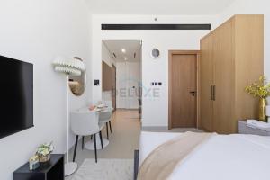 Modern Studio on High Floor with Stunning City Views near Circle Mall and Community Parks - Binghatti Tulip, JVC - by Deluxe Holiday Homes