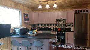 Stream-side cabin and sauna