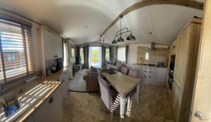 Luxury mini lodge with lakeside views