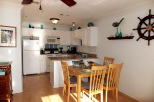 Caribbean Blue steps from the beach Pool view Family friendly