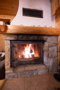 Domki Janosik - Góralski domek z kominkiem, przyjazny zwierzętom, ogrodzony, Łopuszna w Gorcach