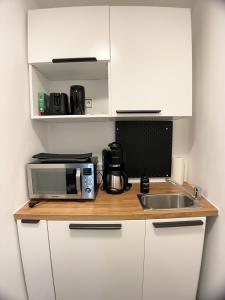 Urban Haven-Zentrum-3 Schlafzimmer-5 Einzelbetten-Waschmaschine