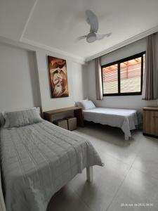 Apartamento de 3 qts com garagem na Praia do Morro a 50m do mar