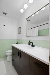 Central Location - 2 living spaces & covered patio!
