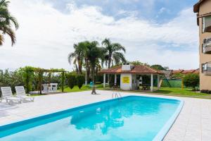 Apartamento de 1 dormitório Ponta das Canas com vista Mar