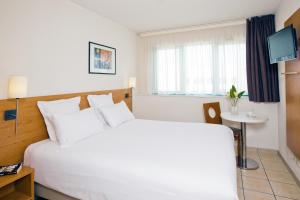 Appart'hotels Sejours & Affaires Serris Rive Gauche : photos des chambres