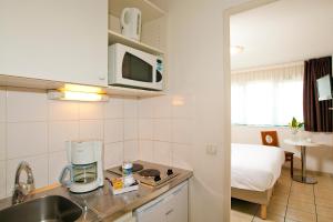 Appart'hotels Sejours & Affaires Serris Rive Gauche : photos des chambres