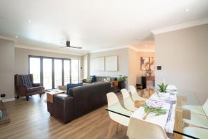 Spacious 4-Bedroom Coastal Haven with Sea Views