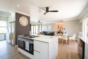 Spacious 4-Bedroom Coastal Haven with Sea Views