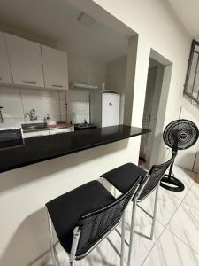 Casa rosa - conforto com split, wifi e água quente