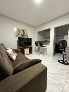 Casa rosa - conforto com split, wifi e água quente