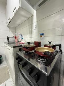 Casa rosa - conforto com split, wifi e água quente