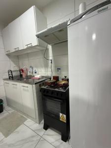 Casa rosa - conforto com split, wifi e água quente