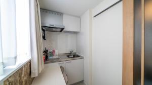 さくら旅館高円寺北千利休101号室