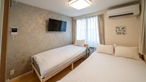 さくら旅館高円寺北千利休101号室