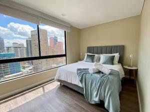 Cozy 15th-Fl Sunset Loft by La Candelaria & Market