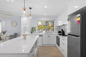 Poolside Paradise 5BR Family Haven with pool 1 Morane Ct