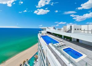 Encantame -Oceanfront Lux Lazy River 2BRRooftop Pool