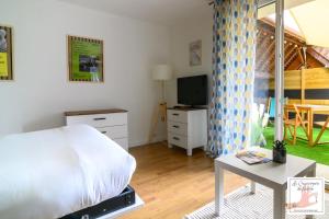 Coin de paradis et sa terrasse au coeur de Milly