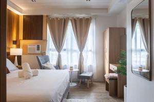 The Fifth By Belabeu - a stylish one-bedroom unit at Mesavirre Garden Residence