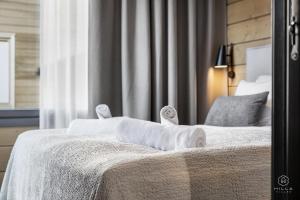 Levin Lyhty Bria for 3 guests and Beatrice for 6 guests by Hilla Villas