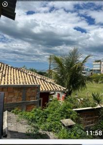 pe na areia santinho