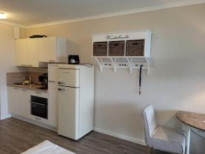 Kleine Schönheit mit Seeblick