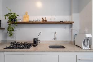 Ap moderno e estiloso a passos da praia