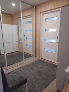 The other side of the CLT semi-detached house, with a separate SPA