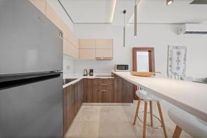 Bright 2BR Amira District Gem with Shared Pool