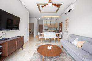 Bright 2BR Amira District Gem with Shared Pool