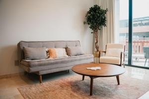 Bright 2BR Amira District Gem with Shared Pool