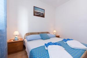 Family-friendly apartments with swimming pool Punat, Krk - 5345