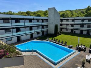 Modernes Seeblick Apartment mit Sauna und Poolnutzung