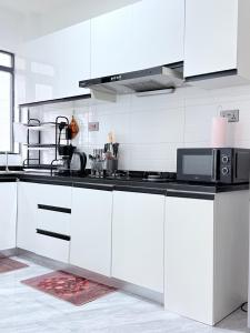 1BR Apartment with Pool and Gym at Yaya