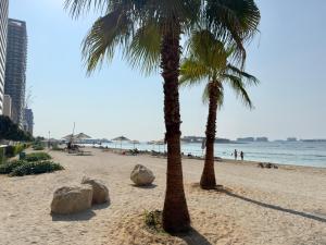 Beachfront Luxe 1BR Grand Bleu with Private Beach & Sea View