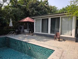 FreeCulture - Luxury 2BHK Farm Stay with Private Pool & Garden in Noida