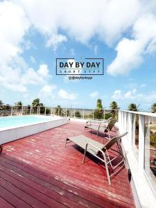 Puerto Ventura by Day by Day