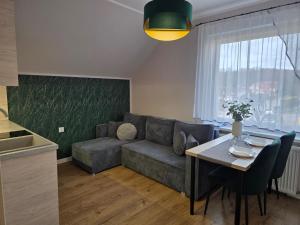 Domek pod świerkami