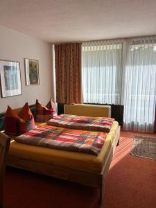 Ferienwohnung mit Schwimmbad und Gartenblick