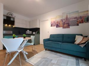 Moderno bilocale con balcone e posto auto a Trento