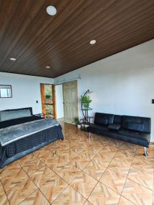 Hygge House with a view of the Arenal Volcano and the San Carlos Plain