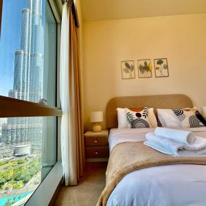 Grande Signature Burj Khalifa view 4 Min walk Dubai Mall Infinity Pool with Fountain View Free parking By The Meridian