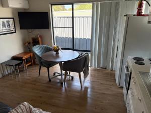 3x1 unit at back of main house