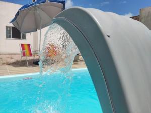Casa de condomínio em Paripueira com piscina e perto da praia