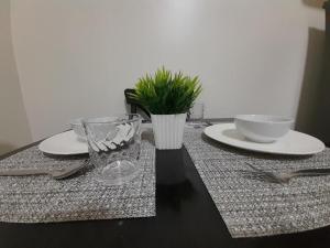 1BR with Balcony Cool Breeze Morning Sun by Cherisias Hideaway