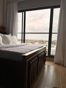Mimahs cozy getaway near JKIA at Taurus Residences